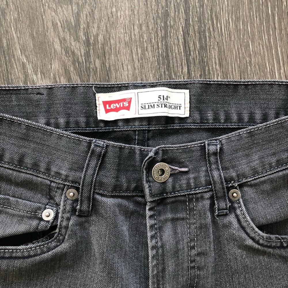 Levi’s mid rise 514 boot leg fit black acid wash jeans size 28 y2k